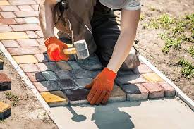 Henry Manders Bestrating logo